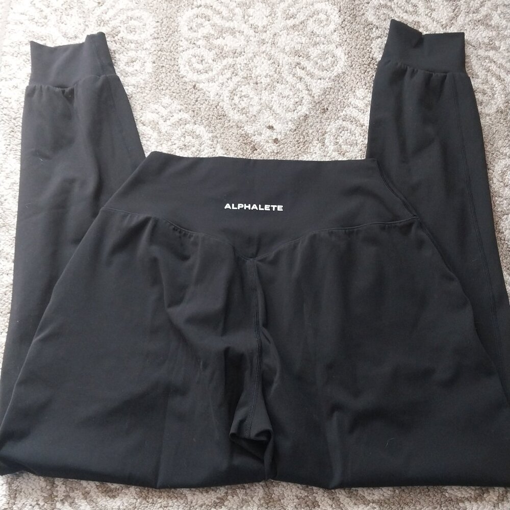 Alphalete  black surface expanse joggers, size small